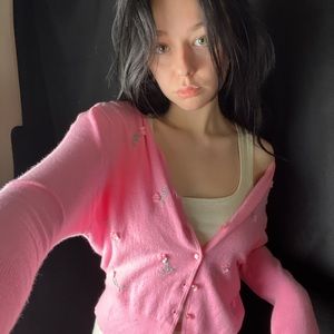 Pink sweater with roses on it!